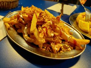 Salchipapas at B13 Bar in Madrid