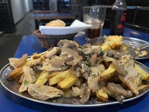 “pollo” al ajillo  at B13 Bar in Madrid