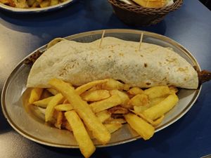 "Pollo" al ajillo con patatas at B13 Bar in Madrid