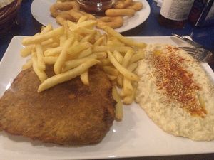 Combo plate with seitan, french fries and hummus at B13 Bar in Madrid