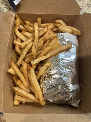 Huge serving of fries with falafel wrap  at Josef's Gyros & Kabobs in Appleton