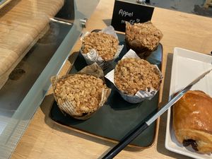 Vegan carrot cake muffin: fluffy and tasty (not too sweet) with nice pieces of carrot and raisins at  Flo Specialty Coffee & bakery in Utrecht