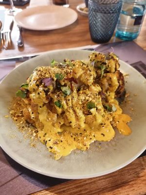 Roasted cauliflower with delicious sauce (lemon, mint, curry...) at Nonna Paquita Ristorante - Pizzeria in Palamos