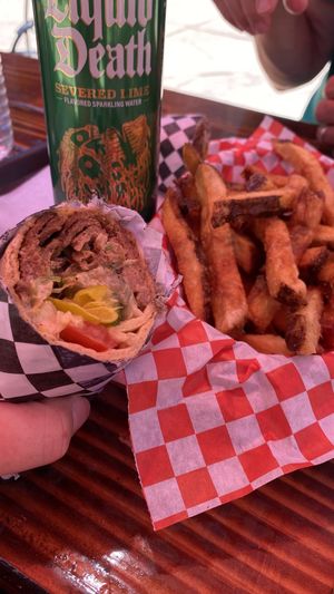 Beef shawarma with a side of hand cut fries and a beverage.   at The Fix in Reno
