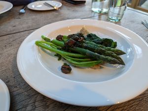 Chickpea pancake with green asparagus. Come de rapa and black olives at Marle in Hook