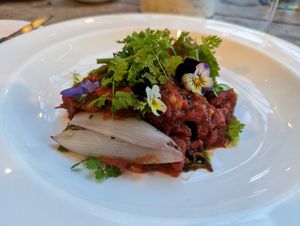 Shallots with freekah, spiced tomato sauce and prunes at Marle in Hook