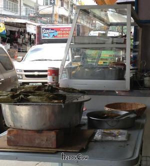 Dessert: delicious charcoal baked sticky-rice with yams or bananas, wrapped in banana leaves at Youta Vegetarian Food Stall in Hua Hin