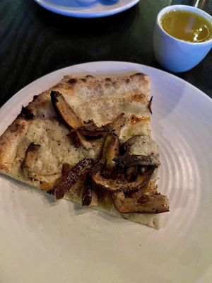 Vegan fungi pizza with vinaigrette on the side   at Pizzana in Dallas