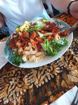 Pasta with tomato sauce, soy chunks, fresh avocado at Emperor Ital Joint in Cape Coast