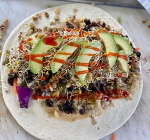 Thai Burrito with super-food add-on (sprouts, avocado, and walnuts) at Hippy Eats in Austin