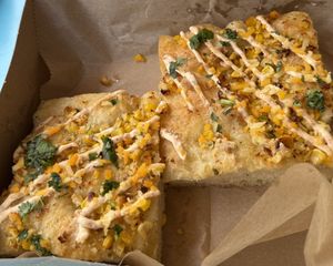 Elote sheetza 🤍🌱  at Bolivar Bread Bakery in Harpers Ferry