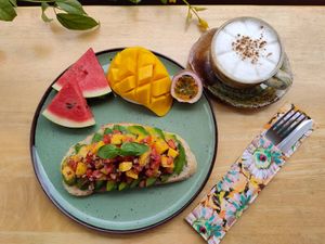 Avocado mango salsa & hot cappuccino oats milk. at Sunflower Smoothies and Coffee in Chiang Mai