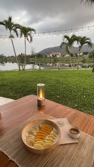 Yellow fruit bowl (customised: no granola added; classic yogurt was replaced with vegan organic cashew yogurt)   at Woo Phuket in Phuket