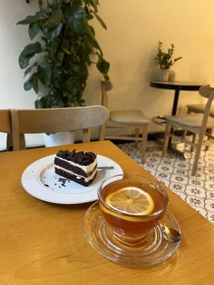 Vegan chocolate cake, with a cup of ginger & lemon tea   at NewDay Patisserie & Coffee in Hanoi