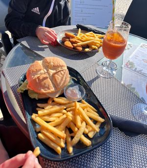 Burger, nuggets and mocktails  at Sam's Coffee and Bistro in Armacao De Pera