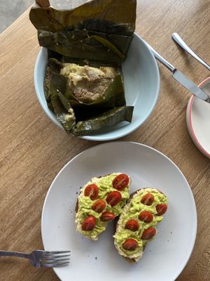 Avocado hummus toast and tamal  at Valiente Café in Bogota