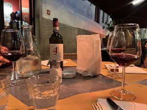 Table with wine  at Trattoria 4 Leoni in Florence