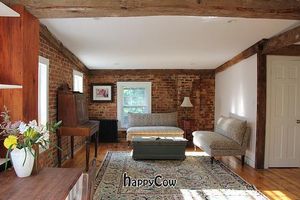 The Sampson Suite living room at The Homestead guesthouse at Catskill Animal Sanctuary. at The Homestead Guesthouse in Saugerties