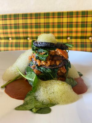 Vegan lasagna of potato and radish. Smokey grilled potato in combination with sweet pepper sauce. at Restaurant GENUSSWERKSTATT Einbeck in Einbeck