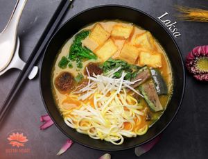 Quynh House laksa served with thick noodles topped with tofu, mushrooms, and greens in our rich coconut soup based. Surely, there's an option for vegan lovers.  at Quynh House Vegetarian Dining in Ho Chi Minh City