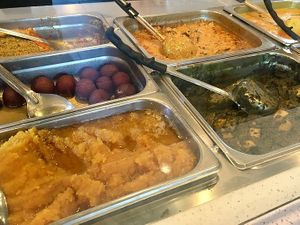 Gulab jamun, and curries at Masala House Grocery in Eastvale