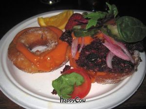 The famous beet burger on a donut bun. Amazing yum. at Hella Vegan Eats in Oakland
