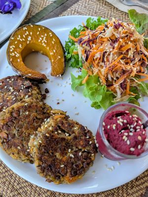 Mushroom and lentil patties with beetroot hummus at Soulscape Café in Koh Phangan
