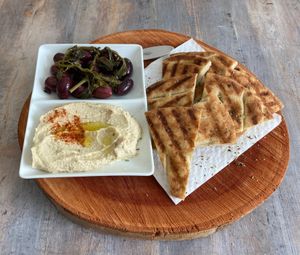 Pita with olives and hummus  at N-Joy in Kos