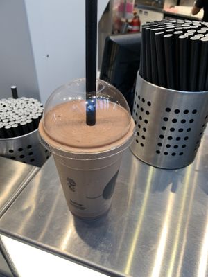 Chocolate peanut butter protein smoothie. So good 👌🏽  at SYD - Pulp+Grind - T2 in Mascot