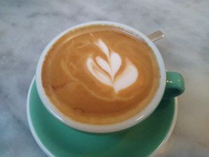 Flat white - vegan milk options include oat and almond at Fette Henne in Mainz