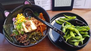 Yellow ramen noodles with shiitake base and tofu, bamboo shoots, corn, wood ear fungus and preserved mustard at Neon Ramen  in Everton Park