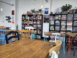 Inside of the cafe, showing their collection of board games at Common Meeple Board Game Cafe in Swansea