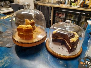 Variety of cakes at Common Meeple Board Game Cafe in Swansea