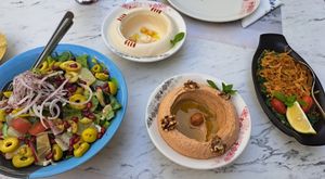 Habib salad, sunset hummus, beiruti hummus and hindbeh at Habib Beirut in Amman