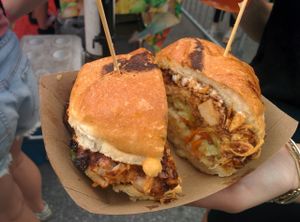 Pulled BBQ jackfruit sandwich; slaw, pickles, shallots, horseradish aioli on a potato bun at Chickpea & Olive in Brooklyn
