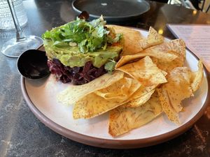 Avocado and beet salad sashimi with taro chips   at PLANTA Queen in Washington
