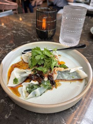 Spinach Dumplings 6/10 - they were falling apart and not evenly steamed, taste was so so  at PLANTA Queen in Washington