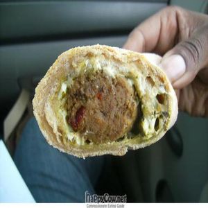 Vegan pig in a blanket made with field roast sausage, dayia cheese, and vegan pesto at Whole Foods Market in Sacramento