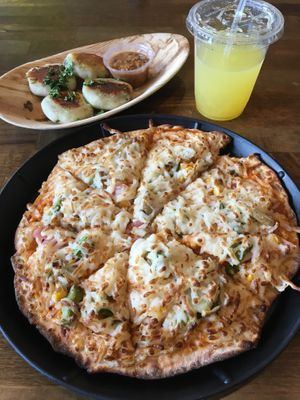 Stuffed Potato Cakes & Roasted Potato and Veggie Signature Pizza. at Pizza Karma in Apple Valley