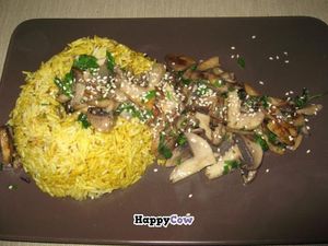 Wild mushrooms on a flavored rice ring at Omra Elias at Omra Elias in Bucharest