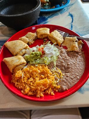 Mushroom flautas with vegan cheese and sourcream. Beans and rice also vegan at Crepe Haus + El Compadre in Kennewick