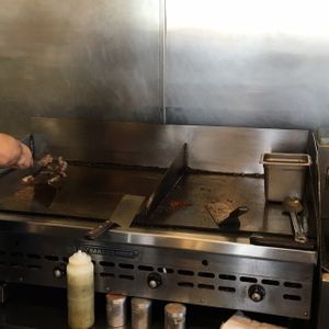 Separate grill for vegan food prep (right side) at Tacos Cancun in Costa Mesa