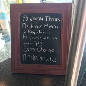 Upcharge notification at Tacos Cancun in Costa Mesa