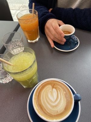 Cappuccino with oat milk and juices   at Greasy Spoon - Södermannagatan in Stockholm