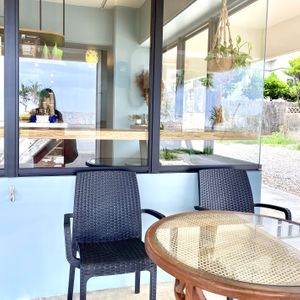 2Dog hooks🐕And new out side table and chairs.  at Blue Point Falafel & Coffee in Yomitan