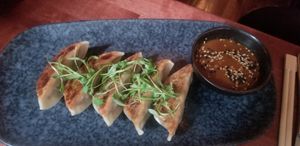 Lion's mane dumplings with daikon sauce at Third Kingdom in New York City