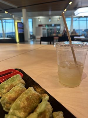 Vegetation dumplings (confirmed vegan by the chefs) + Lychee iced tea. YUM! 11/10 Crispy dumplings. So good!   at CBR - Noodles XO - T2 in Canberra