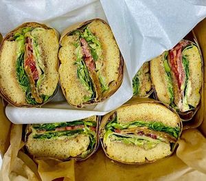 Tempeh katsu sandwich - house baked organic focaccia, yellow pea tempeh, tapenade, fresh veggies at Niu Life Kitchen in Wailuku