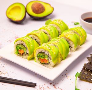 Avocado Sushi.
Sushi rice, vegan cream cheese, salad, cucumber, avocado, carrot, seaweed, soy sauce, wasabi, pickle ginger. at Dobro Top Vegan   in Dubai