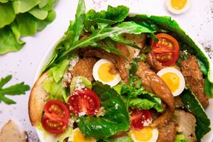 Caesar Salad. 
Vegan non-chicken with vegan non-egg mixed with fresh greens, tomatoes and our signature vegan caesar sauce.  at Dobro Top Vegan   in Dubai